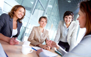 business women at conference table
