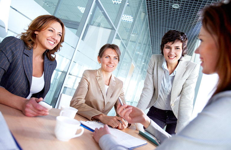 business women at conference table